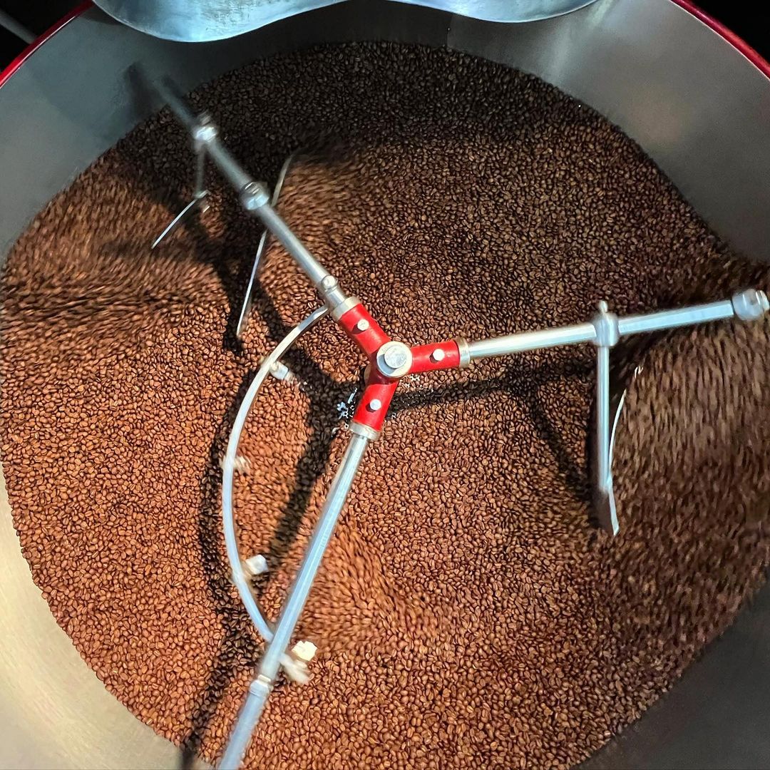 Coffee beans cooling in a roaster.
