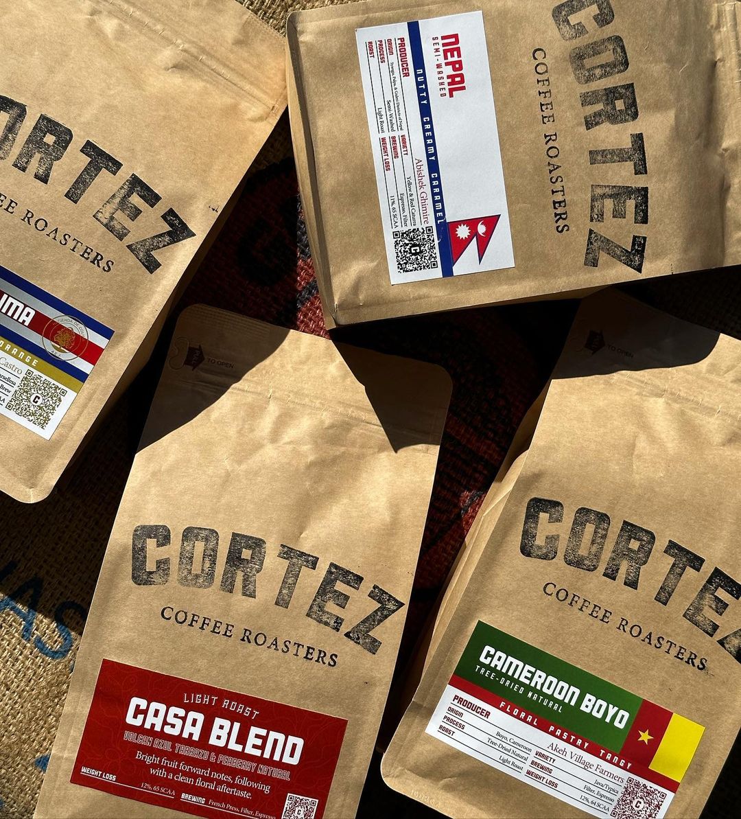 Cortez branded coffee bags.